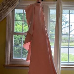 Long pink sleeveless maternity gown